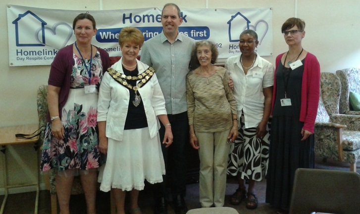 Cllr Jane Boulton with Crossroads CEO Janet Fevrier and staff at the Homelink Day Care Centre
